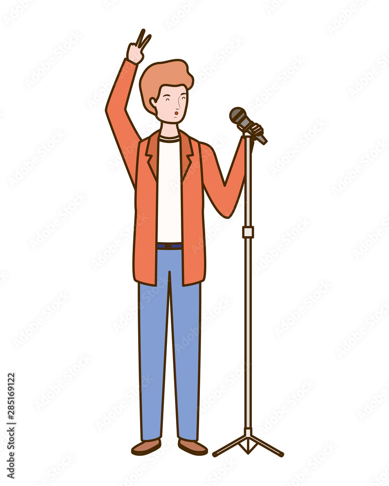 Wall mural young man with microphone on white background