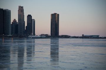 frozen lake and cityscape