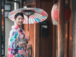 Women Floral Printed Long Kimono  in traditional japanese farmhouse.