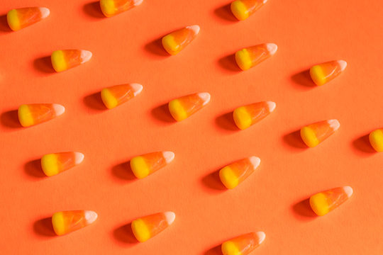 Candy Corn Pattern on an Orange Background