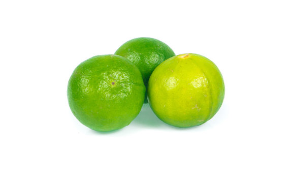 green lemon isolated on white