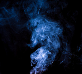 movement of Light blue smoke Abstract on black background.