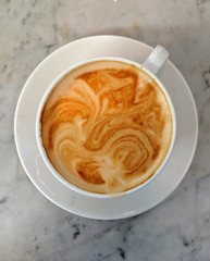 cup of coffee with Rosetta art