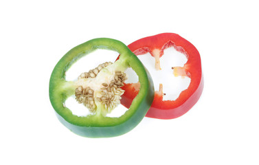 peppers with white background. Cut in half with slices