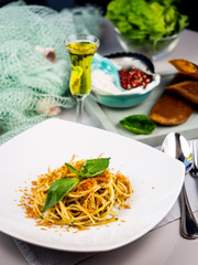 Pasta with sauce. Spaghetti. Restaurant serving dishes.