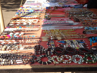 funky jewelries displayed outside of roadside shop