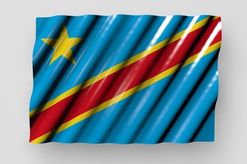 nice any celebration flag 3d illustration. - shiny flag of Democratic Republic of Congo with big folds lay isolated on grey