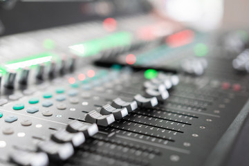 Obraz na płótnie Canvas Music mixer equalizer console for mixer control sound device. Sound technician audio mixer equalizer control. Mastering For Radio and TV Broadcast.