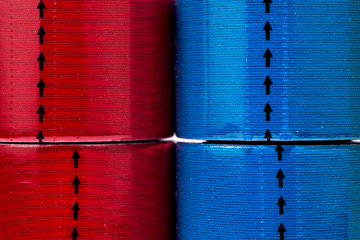 Colorful geometrical figures from reels of medical tape.