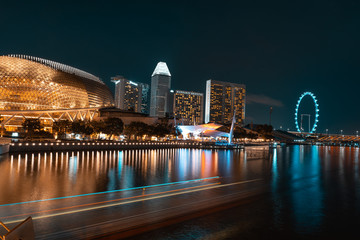Fototapeta na wymiar SINGAPORE - MAY 19, 2019: View of the Downtown Singapore skyline and Marina Bay at night.