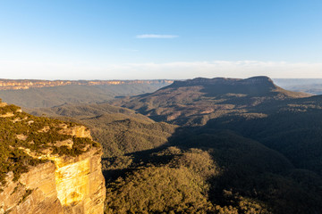 As the sun lowers in the horizon, the colours cast themselves across the valleys of the Blue...