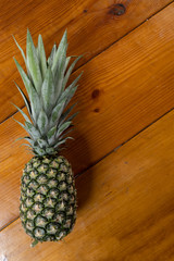 pineapple on wooden background