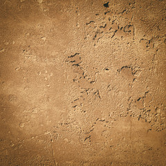 Urban concrete wall background with grooves and bubbles. Cement gray wall. Urban and industrialization art concept. Texture like concrete, stone, cement, plaster.. Poster mockup. Сloseup studio shot.