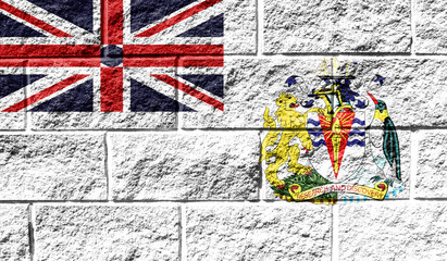 Flag of British Antarctic Territory close up painted on a cracked wall