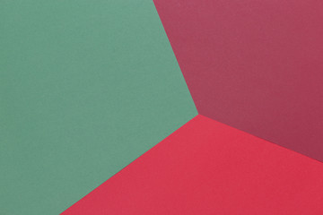 Paper green, burgundy, red empty background, geometrically located. Color blank for presentations, copy space.