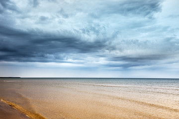 Fototapeta na wymiar Blue and dark Baltic sea at Latvia coast.