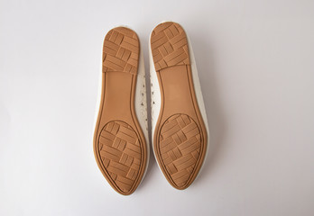 White couple with embroidered ballet shoes. On a white background, sole