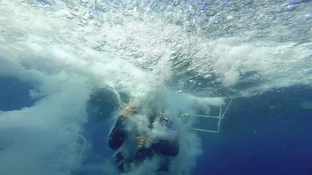Scuba Diver Jumping Off The Dive Boat - Slow Motion