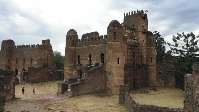 Ascending rotating drone flight of spectacular historic palace, Fasil Ghebbi Royal Enclosure fortress, architecture and cultural heritage in Ethiopia Africa