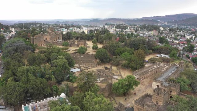 Establishing drone flight of historic Fasil Ghebbi fortress set on strategic hilltop in Gondar, Ethiopia