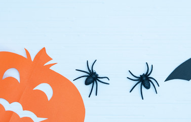 Halloween on wall decoration concept - black paper bats, devil, witch, spider, pumpkin