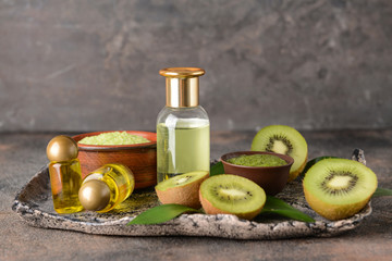 Cosmetics with kiwi on tray