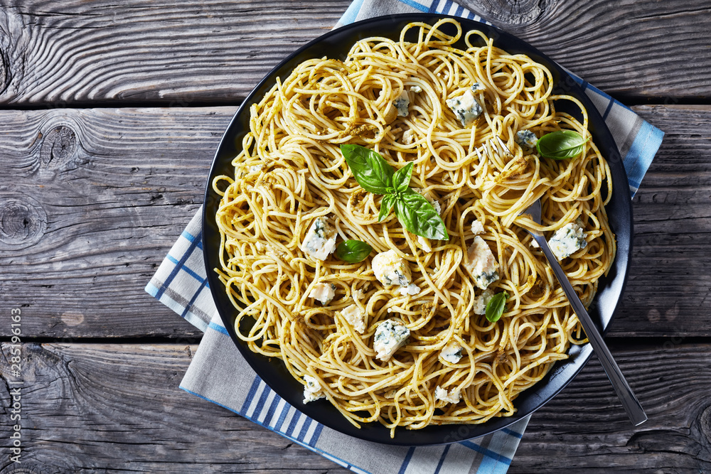 Wall mural pasta with basil pesto and blue cheese