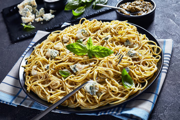 close-up of delicious pasta with basil pesto