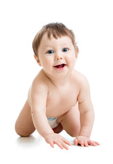 Adorable baby boy learning to crawl. Cute cheerful child crawling on floor. Kid toddler weared...