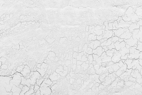 Grey lime plaster with cracks background