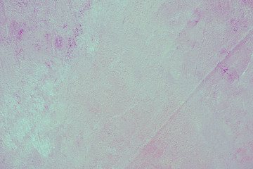Blue and pink paint on concrete wall