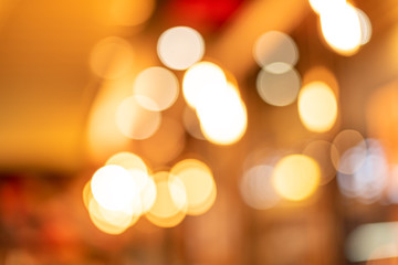 Christmas and Happy new year  concept . Blurred of gold abstract background with bokeh defocused lights for greeting card