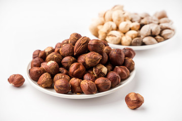 nutritious nuts, hazelnuts on a white background