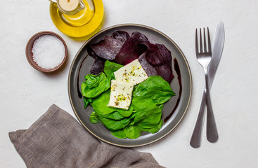 Beetroot, spinach and cheese salad. Healthy eating. Vegetarian food.