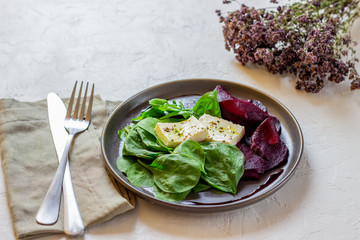 Beetroot, spinach and cheese salad. Healthy eating. Vegetarian food.