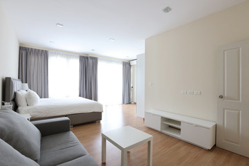 new modern white bed in bedroom with soft and clear light