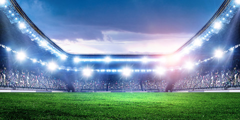 Full night football arena in lights - obrazy, fototapety, plakaty