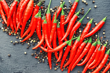 Hot red pepper. Chilean pepper on a black.