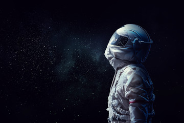 Spaceman in space, a spacewalk - obrazy, fototapety, plakaty
