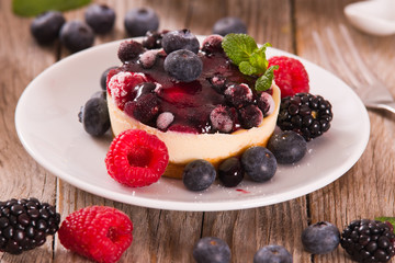 Cheesecakes with mixed berries.