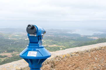 Tower viewer or tourist telescope with space for copy on the right.