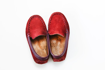 Child shoes on a background with space for text. Top view