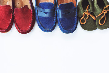 Child shoes on a background with space for text. Top view