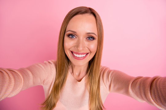 Close up photo of nice person use make photos isolated over pink background