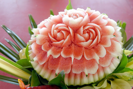 Beautiful Thai style carving watermelon in rose flowers shaped. Selective focus