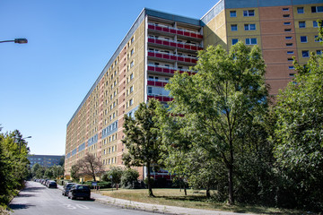 Typical modernized residential buildings in Leipzig district Grünau with blue sky, architecture from the GDR from the 70s and 80s of the last century