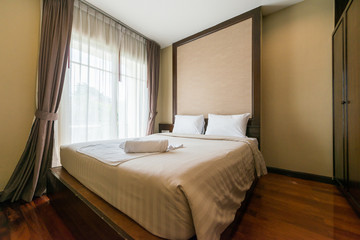 Modern interior design in small apartment with bedroom