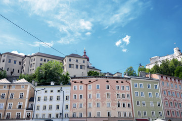Fototapeta na wymiar Street with old colorful houses in Salzburg, Austria