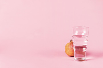 Glass of water and pomegranate fruit
