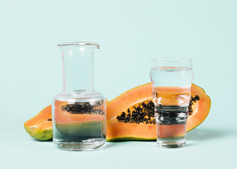 Papaya fruit and glasses filled with water